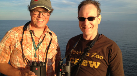 David La Puma (left) holding the 10x42 Geovid HD range-finding binocular, and Frank Kohn (right) holding his classic 8x42 Leitz Trinovid binocular, on the Cape May / Lewes Ferry